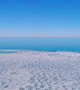 Spectacular drone shows China’s largest saltwater lake freezing