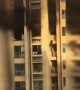 Two residents forced to jump to lower floor to escape high-rise fire