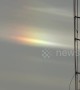 Cold weather in Toronto causes rainbow-like refraction in the sky