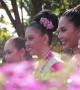 Beautiful scenes from umbrella festival in northern Thailand as local women wear traditional costume