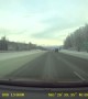Truck Slides into Snow Filled Median Strip