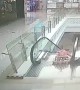 Heroic soldier runs to rescue infant falling down an escalator