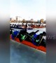 Dragon boat race held on frozen river using ice picks instead of paddles