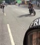 'They are chasing us!' Venezuelan journalist films moment he fled riot police on motorbike