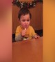 Baby Makes Cute Faces when Eating a Lemon