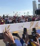 Crowds Cheer as Pope Francis Drives By