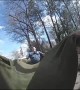 Bodycam shows police using blanket to catch kitten falling from tree