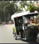Tuk-tuk hits scooter rider in India during crazy reverse race