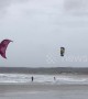 Kite surfers make most of gale-force winds in Cornwall, UK