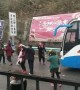 Stranded Chinese tourists get out of their bus and dance on icy motorway