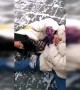 Tourists struggle to walk on slippery snow-covered Great Wall