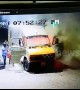 Incredibly brave men push truck on fire away from petrol station