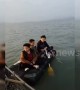 Boys adrift at sea on paddle-board rescued by police