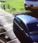 Unbelievable close call between car and  passing train