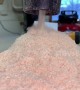 Oddly mesmerising footage sees sawdust sucked through vacuum