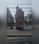 Passenger scales car with furniture stacked 20ft high to clear power lines