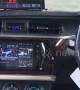 Bangkok taxi driver watches TV in his modified dashboard
