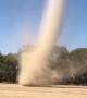 Dust Devil Slowly Moves Across Pasture
