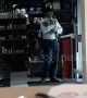 Awwwww! Filipino security guard rocks troubled puppy to sleep