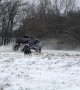 Monster Truck Doing Donuts in the Snow