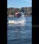 Jet skier makes a splash with a double flip during stunt jump attempt