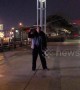 Security guard whips around heavy steel chain to workout