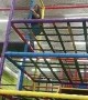 Grown Ups Playing in the Jungle Gym