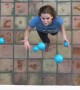 Woman Juggles 5 Balls at Once