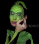 Serbian artist creates amazing Grinch bodypaint illusion