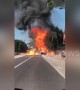 Driver has to reverse to escape burning truck full of exploding butane tanks