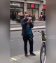 Passionate protester rants into megaphone outside Apple store in London