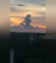 Cloud shaped like a girl seen floating above horizon in China