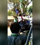 Men drink beer on tractor while canvasing for prohibition candidate in India