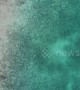 Stunning drone footage of swimmer enjoying Bahamian waters