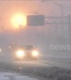 Eerie orange sunrise shines over morning traffic in New York state