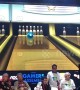 Crowd goes wild as elderly gamer scores a strike a bowling game competition