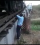 That's dedication! Brave train driver risks life to fix train after it stops on bridge in central India