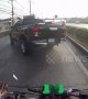 Dashcam shows moment motorcyclist smacks into rear of pickup truck
