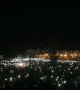 Thousands protest outside Sudan army HQ with phones in the air