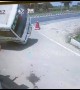 Stunning moment SUV crashes into bus and flips it over on Indian road