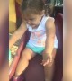 Toddler Girl Gets Stuck on Playground Slide