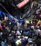 Thais cram onto buses and trains as they begin annual Songkran new year getaway