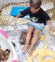 Little Girl Gives Crocodile a Bath