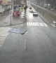 Strong Winds Send Roof into the Road