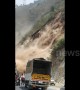 Terrifying moment motorists cheat death in landslide in Northern India