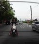 Moped rider in Thailand smashes 'rear windscreen with his head' then rides off