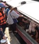 Passengers leap onto canal boat in perilous commute that sees dozens fall into the water every year