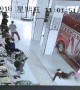 Sliding into danger! Chinese firemen answer emergency call but slip on floor