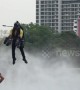 British 'Iron Man' flies jet suit in gridlocked Bangkok claiming it will be the 'future of travel'