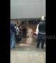 Russian commuters wade through flooded station in Moscow